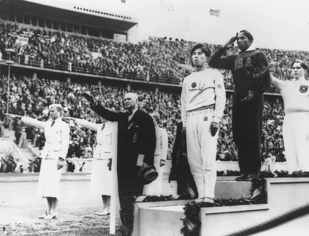 Jesse Owens podium winners gold medal 1936 1936