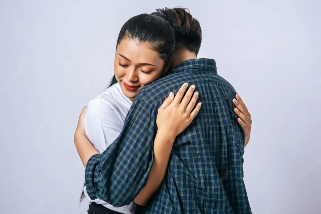 two female couples standing hugging each other 1150 25237